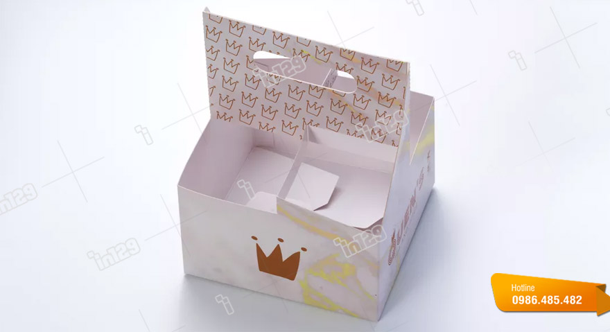Vỏ hộp giấy đựng cốc có quai xách do In129 thiết kế và in ấn